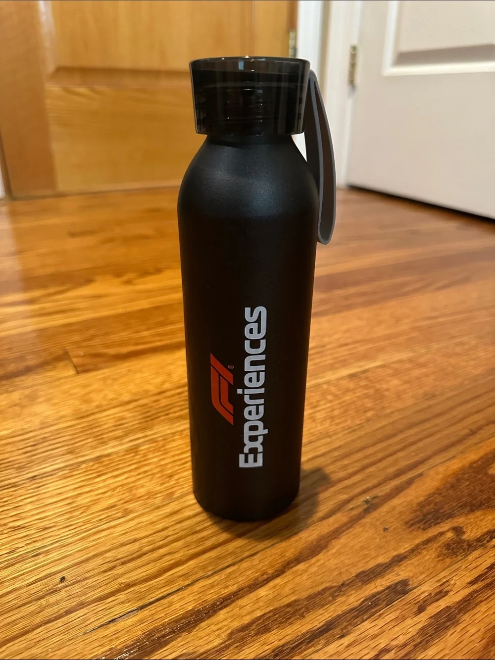 F1 COTA Experiences Paddock Club Black Matte Water Bottle with Red Logo